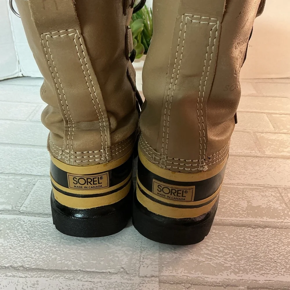 Sorel Men's Black and Tan Snow Boots size 6
